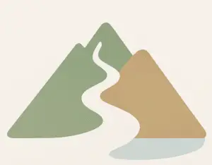A mountain range with a winding path running from the base to the summit, symbolizing the therapy journey